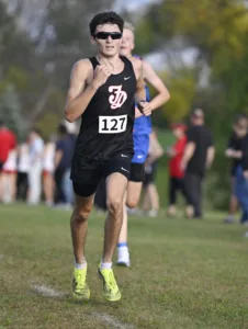 Boys run at Algona